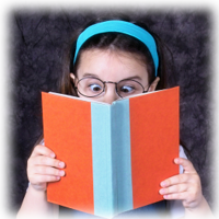 girl reading a scary book